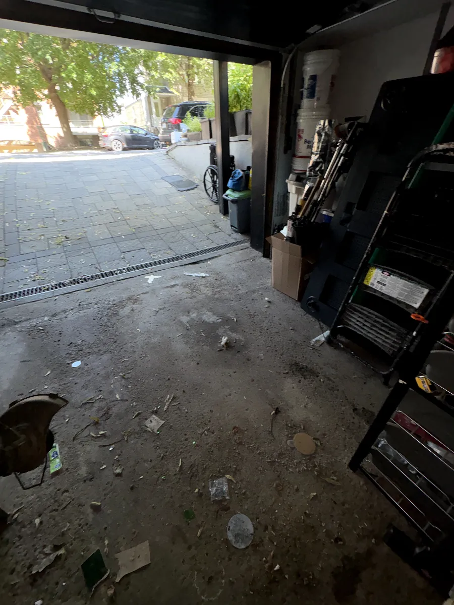 Garage before: bare, stained, dirty concrete